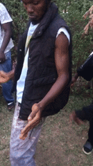 Young man dances outdoors in Jos, Nigeria