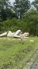 Visitors explore animal park with sculptures in Pa Khlok