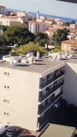 Evening aerial views capture residential Barcelona coastal neighborhoods