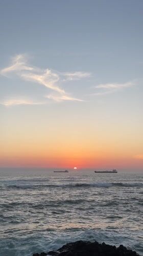 Sunset observed over Pacific Ocean from Arica, Chile coastline