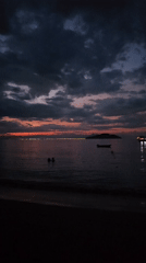 Dramatic sunset captured at Búzios beach during evening hours