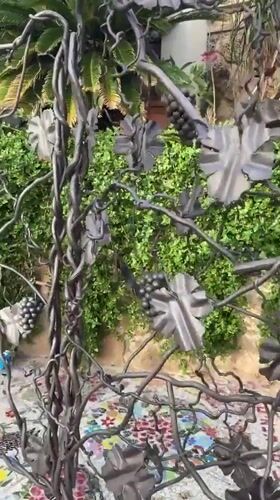 Decorative gate and mountain bike captured in Netanya