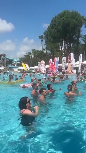 Pink-sequined dance troupe performs poolside at Manavgat resort