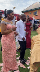 Wedding celebration with dancing and confetti in Nkpor, Nigeria