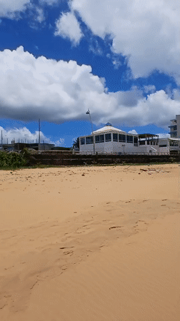 Beach conditions documented in Luquillo with red flag warning