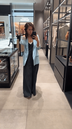 Woman in Dubai spotted shopping and smoking during morning hours