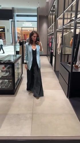Woman in Dubai spotted shopping and smoking during morning hours