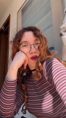 Woman records selfie videos in Barcelona interior setting