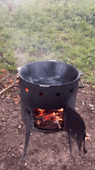 Outdoor cooking and paddleboarding on a cloudy Russian summer day.