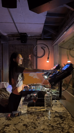 Female DJ performs afternoon set at Seoul bar venue