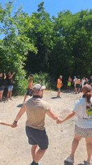 Group performs circle dance in Turkish forest