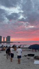 Evening beach gathering with vendors in Iquique, Chile