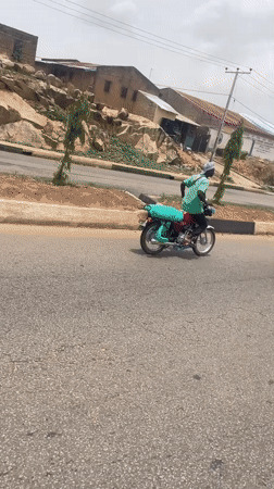 Vehicle procession with speakers, posters travels through Gura Top