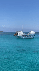 Boat day on the turquoise coast of Neo Chorio, Cyprus