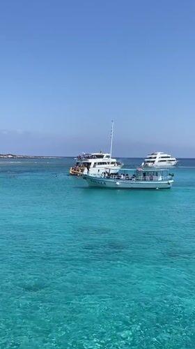 Boat day on the turquoise coast of Neo Chorio, Cyprus
