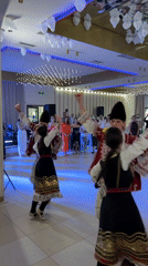 Wedding reception features traditional Bulgarian folk dancers in Serbia