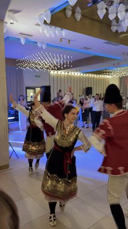 Wedding reception features traditional Bulgarian folk dancers in Serbia