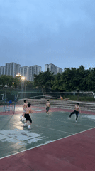 Young men play evening volleyball in Jiangjin, China