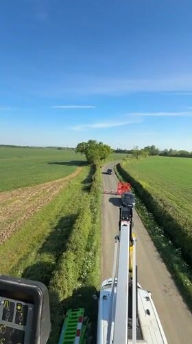 Heavy machinery operator records rural West Suffolk countryside view