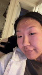 Person and cat share quiet morning moment in New Westminster