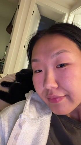 Person and cat share quiet morning moment in New Westminster
