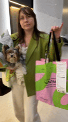 Woman with small dog spotted shopping in Moscow Sunday evening