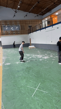 Young skateboarders practice at indoor facility in Ushuaia