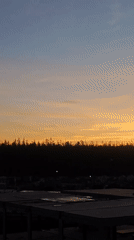 Remote Russia sunrise-sunset documented near telecommunications tower, construction site