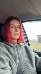 Woman records selfie video in car in Chaikovsky, Russia