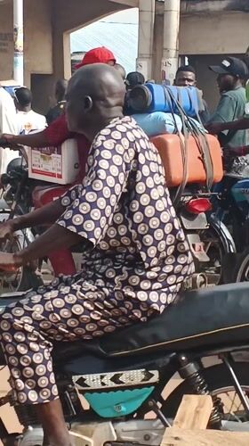 Morning street activity with motorcycles observed in Doma, Nigeria