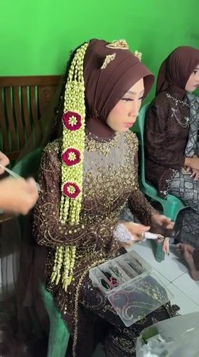 Traditional dress ceremony documented in Wonocolo, Indonesia