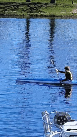 Two kayakers enjoy sunny morning on Jelgava waters