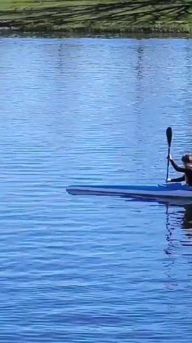 Two kayakers enjoy sunny morning on Jelgava waters