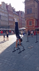 Calisthenics, limbo, and a vintage Škoda at Wrocław plaza
