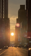 Times Square at sunset, then down into the 42nd Street subway