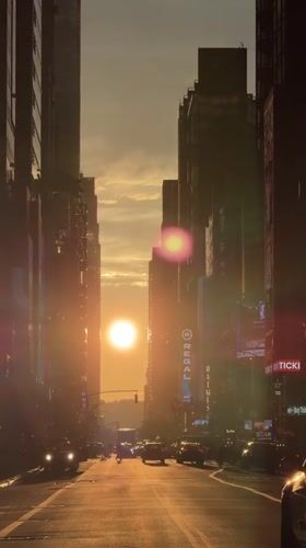 Times Square at sunset, then down into the 42nd Street subway