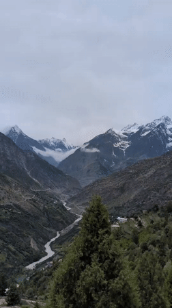 Morning views across Keylang's valley, peaks, and mountain paths