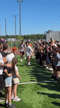 Community fitness class draws dozens to Mytishchi sports field