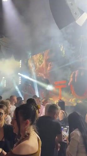Women dance in sparkly leotards at Velingrad nightclub