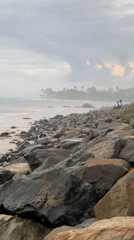 Beachgoers recorded walking Kathaluwa shores under cloudy skies