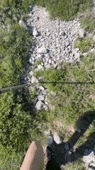 Hikers traverse mountain trails in Montenegro under sunny skies