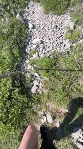 Hikers traverse mountain trails in Montenegro under sunny skies