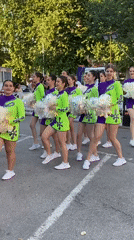 Cheerleaders and strongman athletes share the streets of Pleven
