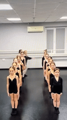 Dance rehearsal and stage performance, two groups in formation