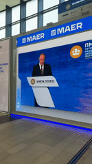 Putin appears on screens at St. Petersburg Economic Forum