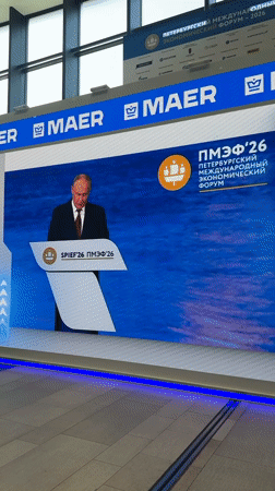 Putin appears on screens at St. Petersburg Economic Forum