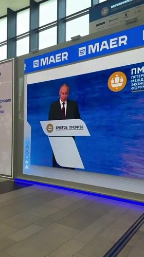 Putin appears on screens at St. Petersburg Economic Forum
