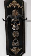 Ornate black and gold wall decoration documented in Barcelona