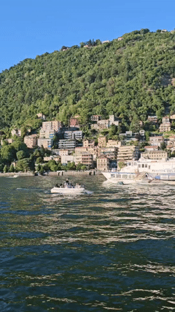 Sunny afternoon boat activity documented across Lake Como waterfront