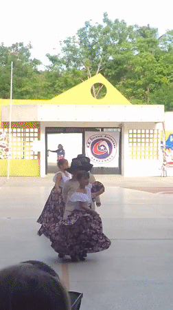 Children perform traditional maypole dance in Cabudare schoolyard